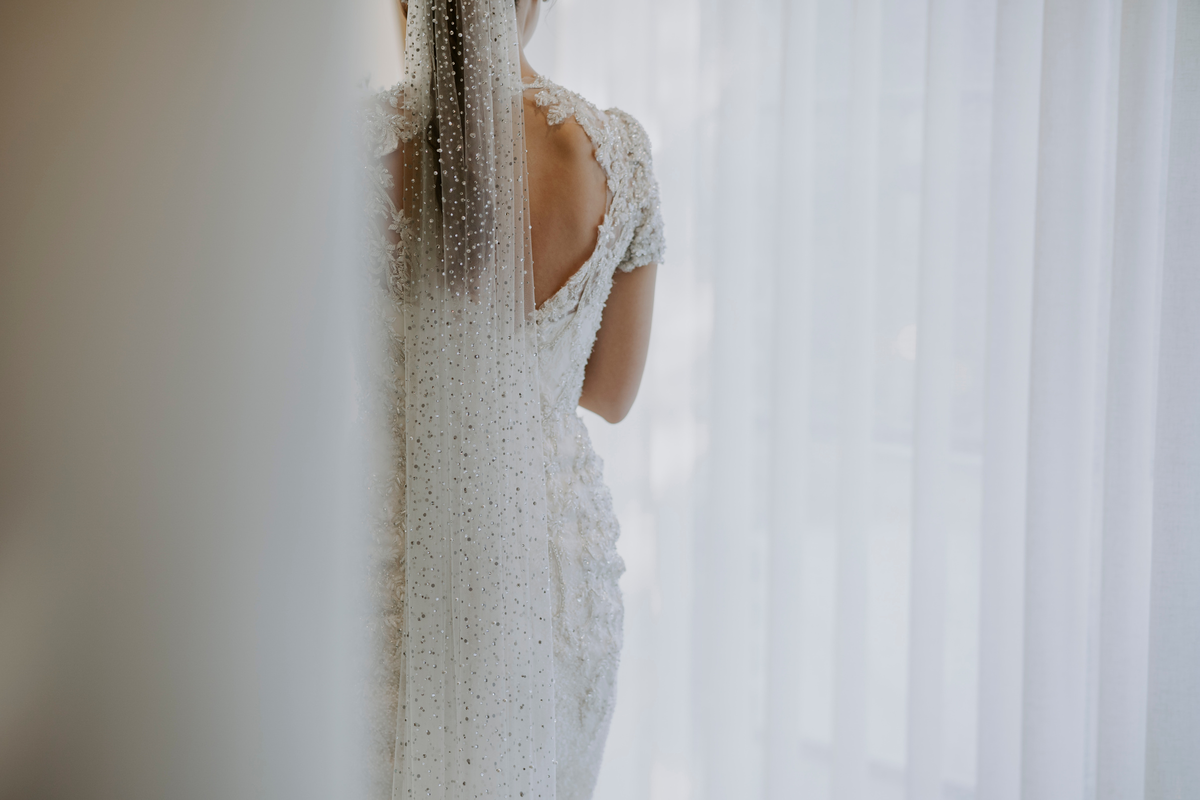 Bride in White Wedding Dress and Veil
